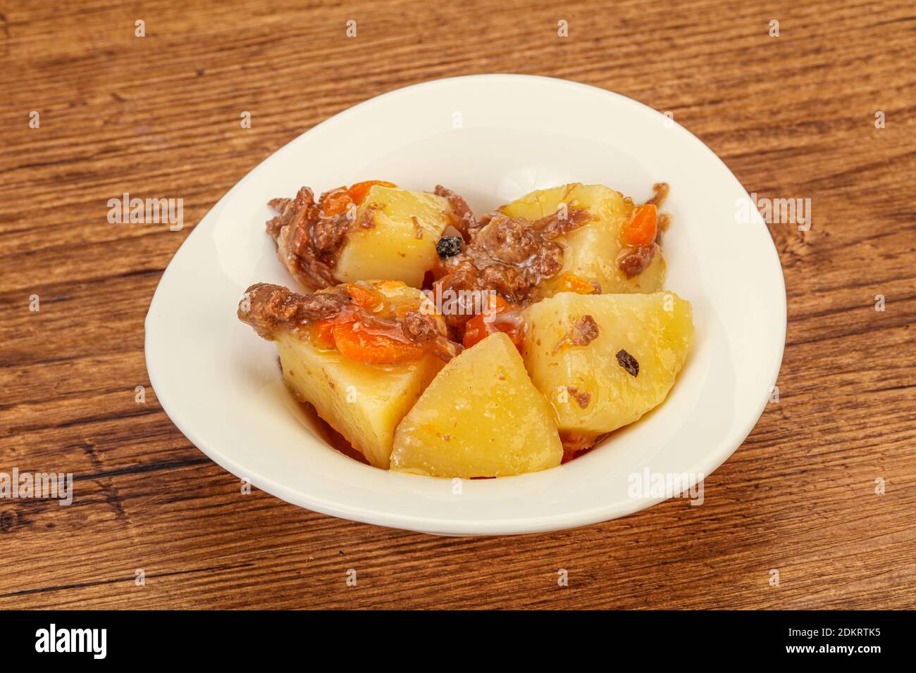 Pommes de terre et bœuf rôties avec sauce et légumes Photo Stock - Alamy