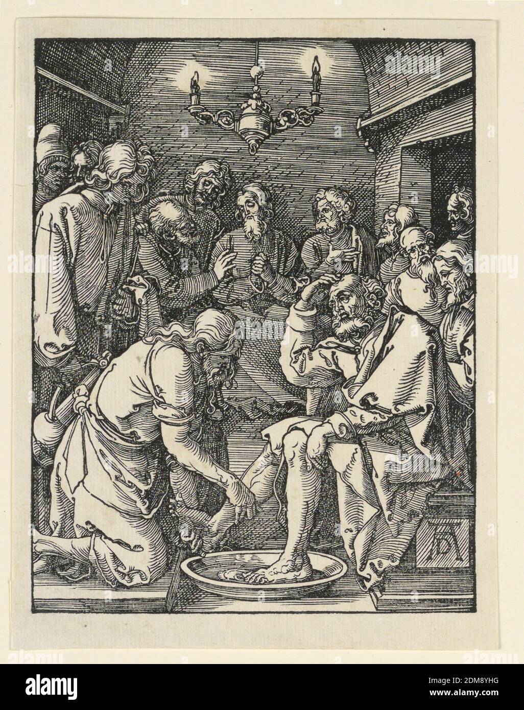 Christ Washing the feet, de la série Little passion, Albrecht Dürer, allemand, 1471–1528, coupe de bois sur papier, intérieur, vue aux chandelles. Christ, s'agenouillant à gauche au premier plan, lave les pieds d'un de ses disciples. D'autres disciples sont en arrière-plan. Monogramme de Dürer, en bas à droite., Allemagne, ca. 1509–1511, Imprimer Banque D'Images