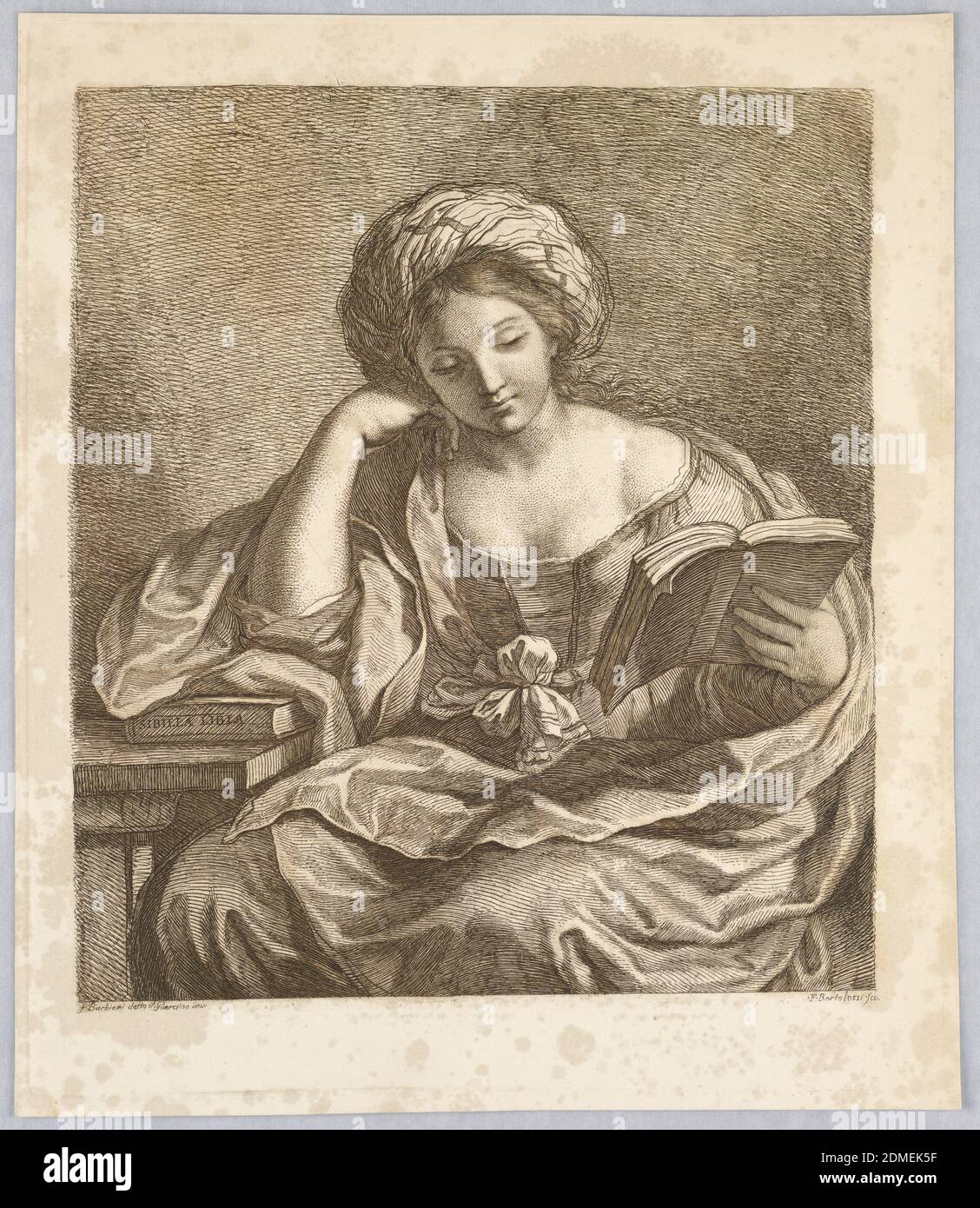 A Sybil, avec un livre, Francesco Bartolozzi, italien, Angleterre active, 1727–1815, Giovanni Francesco Barbieri (appelé Guercino), italien, 1591 – 1666, gravure à l'encre brune sur papier blanc, UNE femme est assise à une table, son coude sur la table à gauche, Reposant sur un livre avec 'SIBILEA LIBIA' écrit sur sa colonne vertébrale. Dans sa main gauche, elle a un autre livre, Open., Italie, ca. 1760–1770, Imprimer Banque D'Images