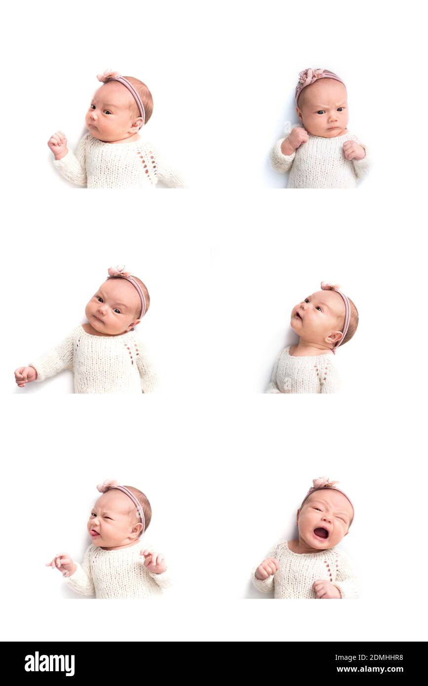 Nouveau-né émotions de bébé, fond blanc. Visage drôle d'un enfant, émotions. Verticale Banque D'Images