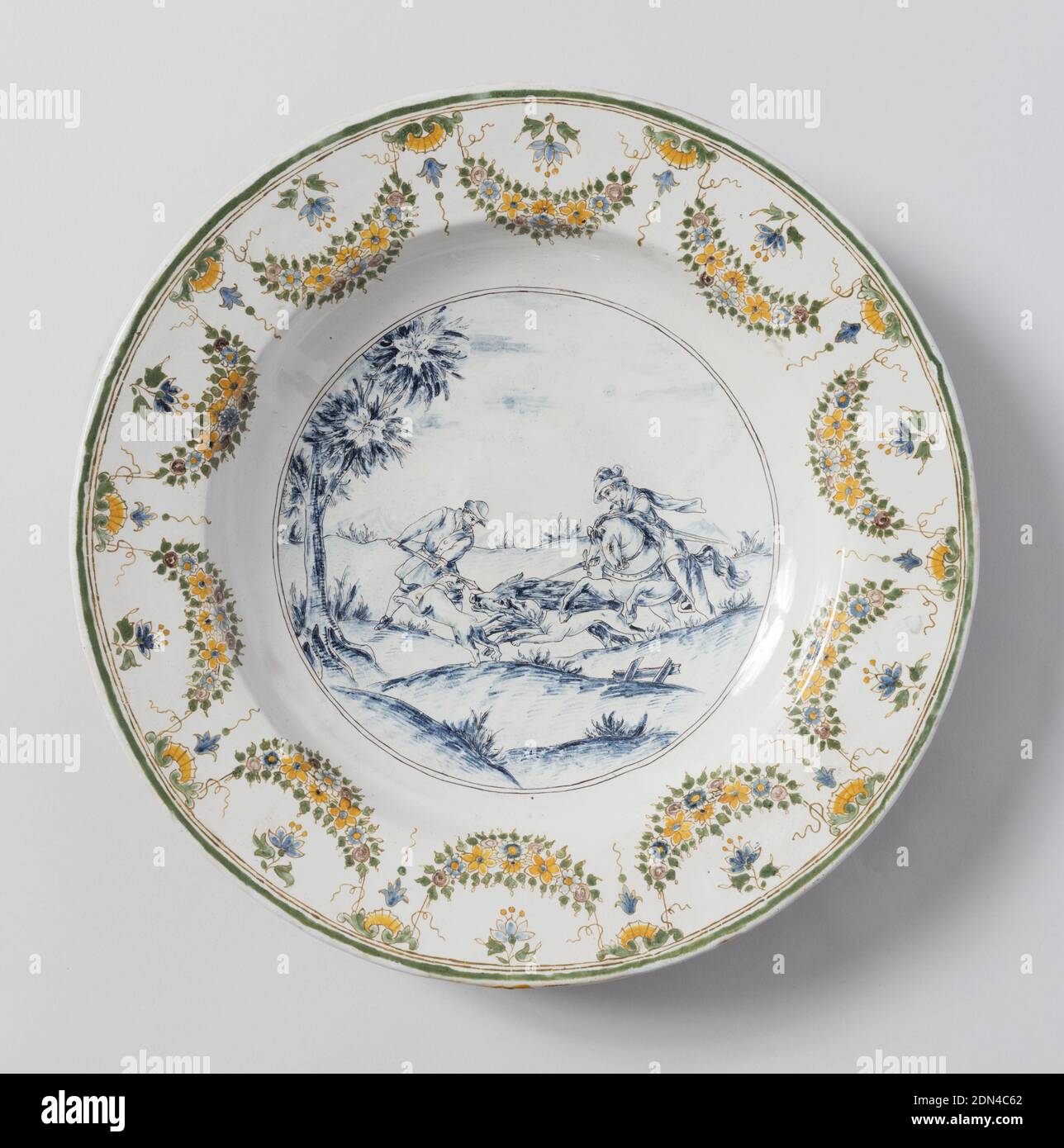 Dish, usine Olérys-Laugier, France, fondée en 1738, faïence émaillée, plat circulaire avec scène de chasse au centre et décoration florale festoon autour des bords., ca. 1775, céramique, Arts décoratifs, plat Banque D'Images