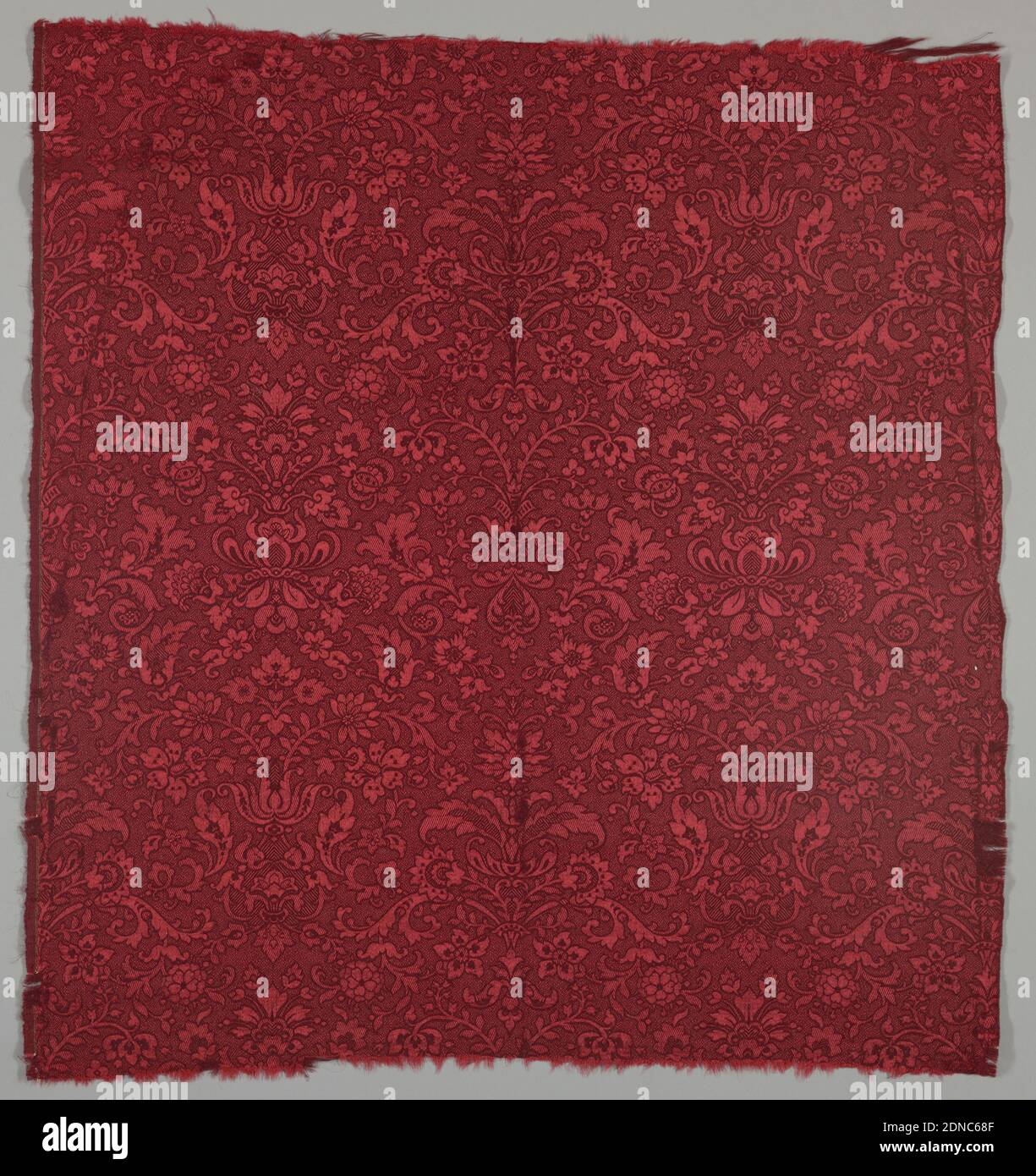 Textile, Moyen: Laine, soie technique: Tissage satin, gauchissement de soie orange et trame de laine rouge foncé. Défilement symétrique motif floral montant verticalement., éventuellement États-Unis, 1850–60, textiles tissés, textile Banque D'Images