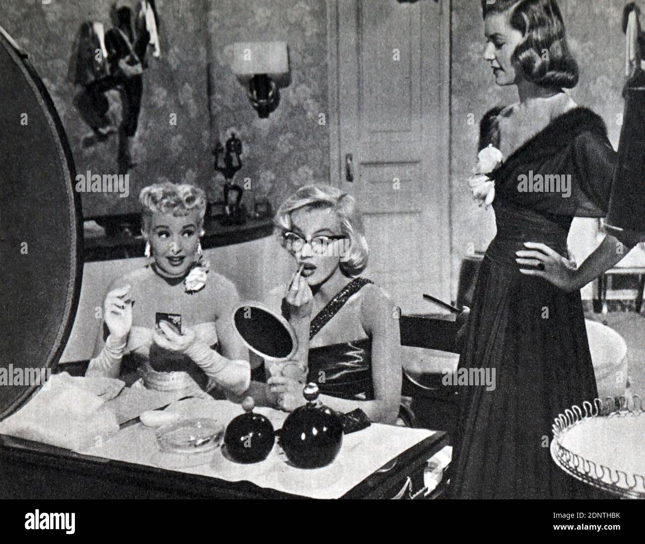 Film encore de 'Comment épouser un Millionnaire' avec Marilyn Monroe, Lauren Bacall, Betty Grable, et Merry Anders. Banque D'Images