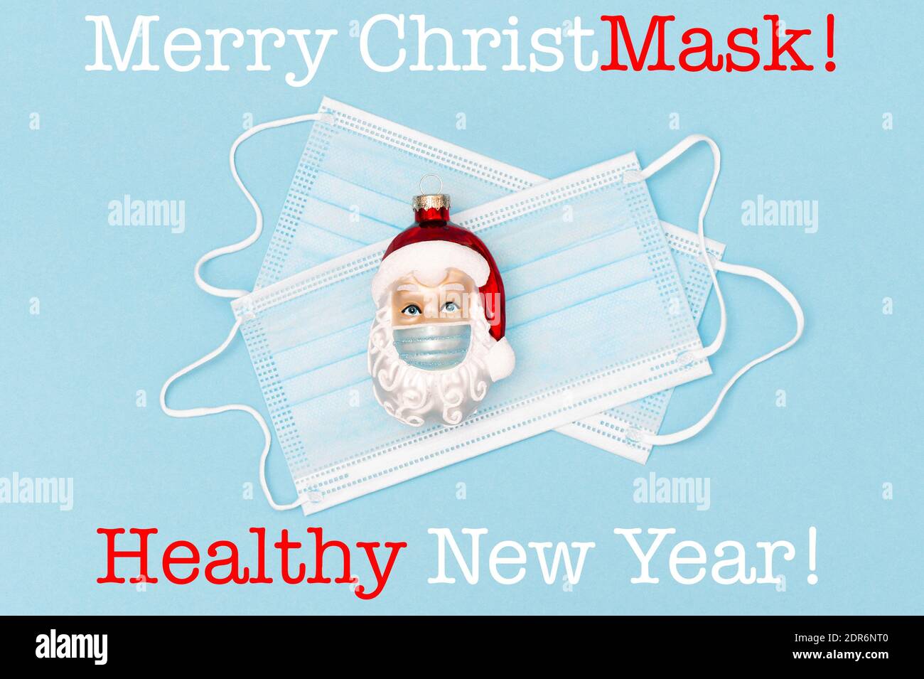 Joyeux masque de Noël sain nouvel an. Décoration de Noël Père Noël et masque de protection Banque D'Images
