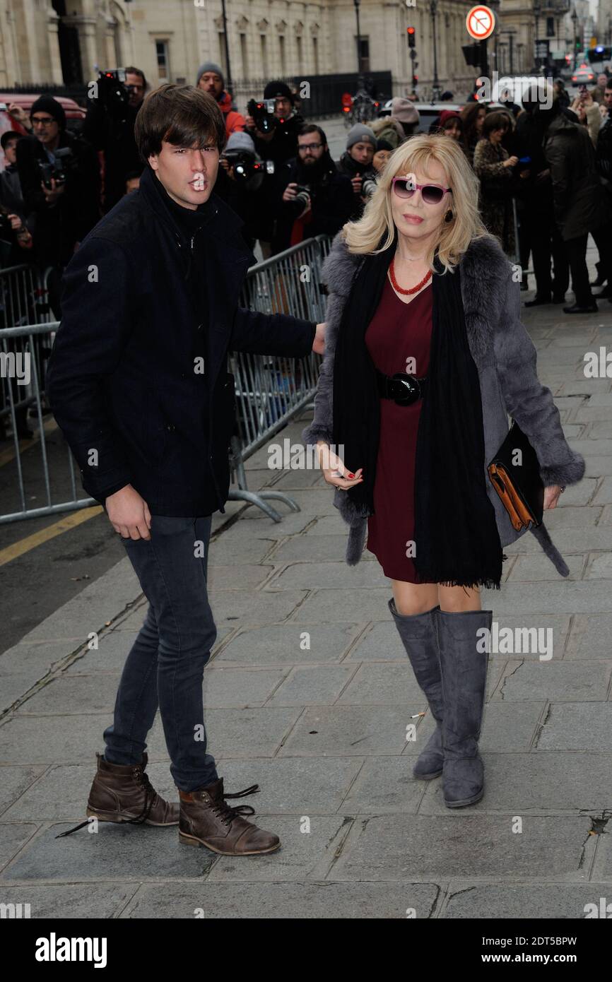 Anthony Hornez et Amanda Lear arrivent au salon de la haute-Couture Printemps-été 2014 de Jean-Paul Gaultier, qui s'est tenu à Paris, en France, le 22 janvier 2014. Photo d'Aurore Marechal/ABACAPRESS.COM Banque D'Images