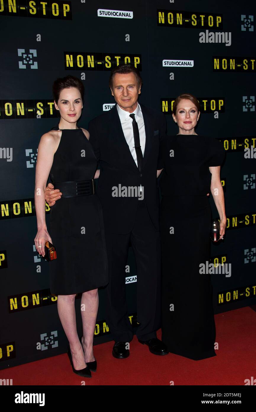 Julianne Moore, Michelle Dockery et Liam Neeson assistent à la première française du film 'NON STOP' qui s'est tenu au Gaumont Opera Cinema à Paris, France, le 27 2014 janvier. Photo de Nicolas Genin/ABACAPRESS.COM Banque D'Images