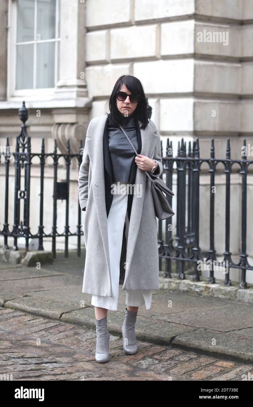 Fatima participe à la semaine de la mode de Londres prêt-à-porter  automne-hiver 2014-2015 tenue à Somerset House, Londres, Angleterre le 15  février 2014. Elle porte un manteau COS, des chaussures Zara, un