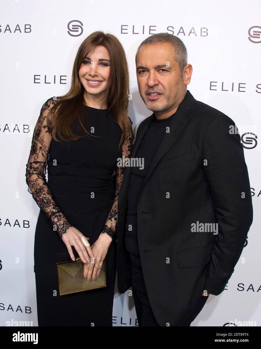 Nancy Ajram et Elie Saab sont les coulisses du salon de la collection  prêt-à-porter Elie Saab automne-hiver 2014/2015 qui s'est tenu le 3 mars  2014 à l'espace Ephemere Tuileries à Paris, en