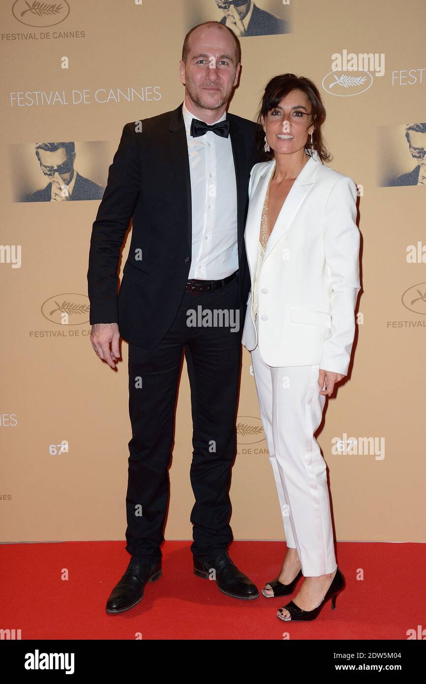 Jean-Charles Sabattier et Nathalie Iannetta arrivent au dîner lors de la  cérémonie d'ouverture qui s'est tenue au Palais des Festivals à Cannes,  France, le 14 mai 2014, dans le cadre du 67ème