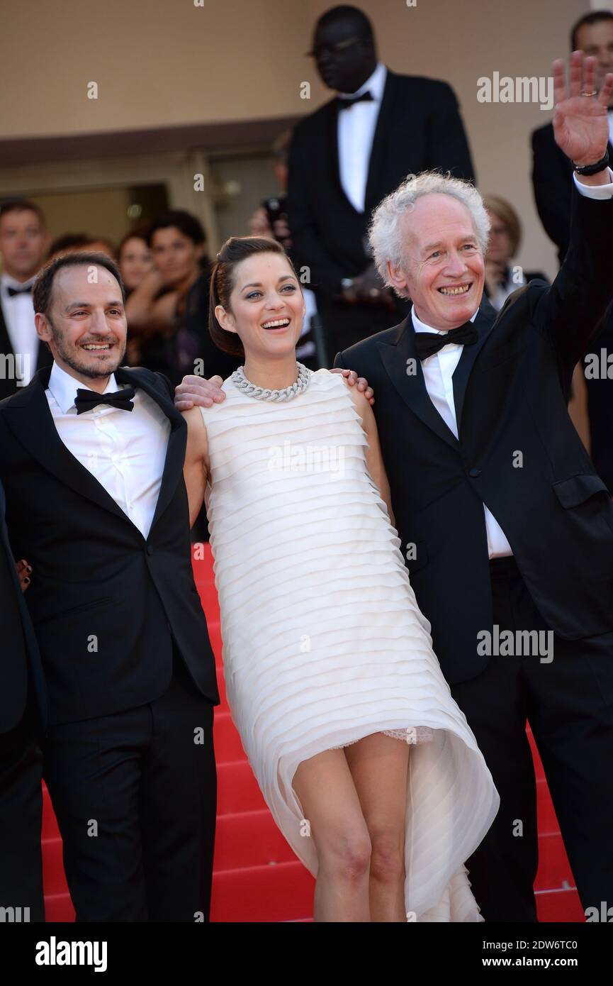 Jean-Pierre Dardenne, Fabrizio Rongione, Marion Cotilard arrive au Palais des Festivals pour la projection du film deux jours, une nuit dans le cadre du 67ème Festival de Cannes, France, le 20 mai 2014. Photo de Nicolas Briquet/ABACAPRESS.COM Banque D'Images