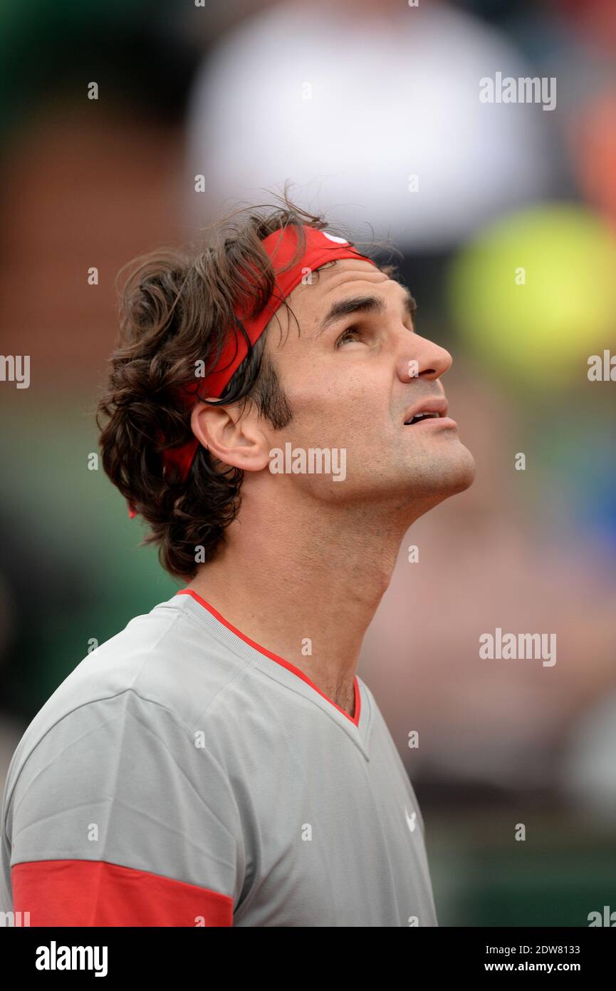 Roger Federer, Suisse, bat 7-5, 6-7 [7], 6-2, 6-4 Dmitry Tursunov, russe, lors de sa 3e partie de l'Open de tennis français au stade Roland Garros à Paris, France, le 30 mai 2014. Photo de Nicolas Briquet/ABACAPRESS.COM Banque D'Images