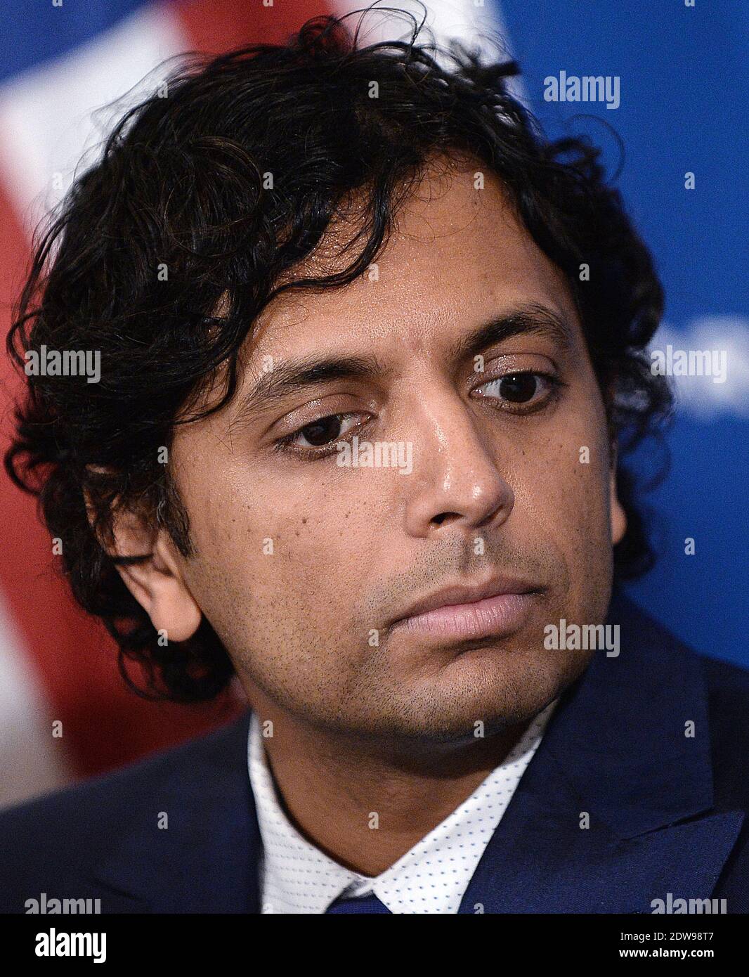 Le réalisateur et scénariste M. Night Shyamalan a prononcé un discours au déjeuner du National Press Club sur la réduction de l'écart de réussite scolaire aux Etats-Unis le 11 juin 2014 à Washington, DC, Etats-Unis. Photo par Olivier Douliery/ABACAPRESS.COM Banque D'Images