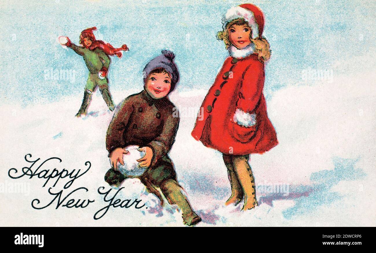 Enfants jouant dans la neige - bonne année Vintage Carte postale Banque D'Images