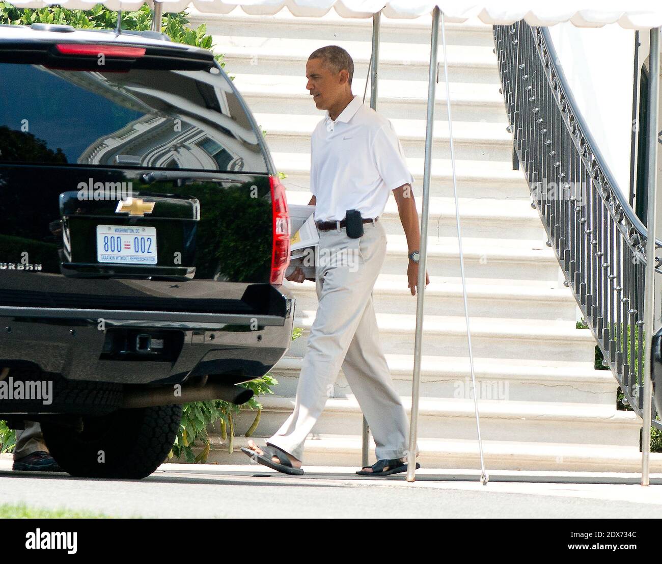 LE président AMÉRICAIN Barack Obama quitte le South Portico de la Maison Blanche à Washington, DC, Etats-Unis, le dimanche 31 août 2014. Photo de Ron Sachs/Pool/ABACAPRESS.COM Banque D'Images