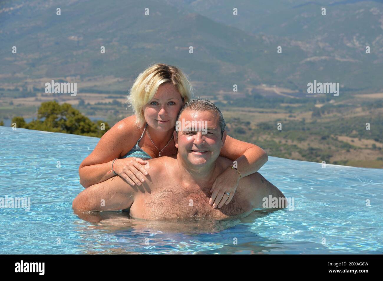 Laurent Gamelon et son épouse lors de la séance photo à Saint-Florent, France, le 18 juillet 2014. Photo de Max Colin/ABACAPRESS.COM Banque D'Images