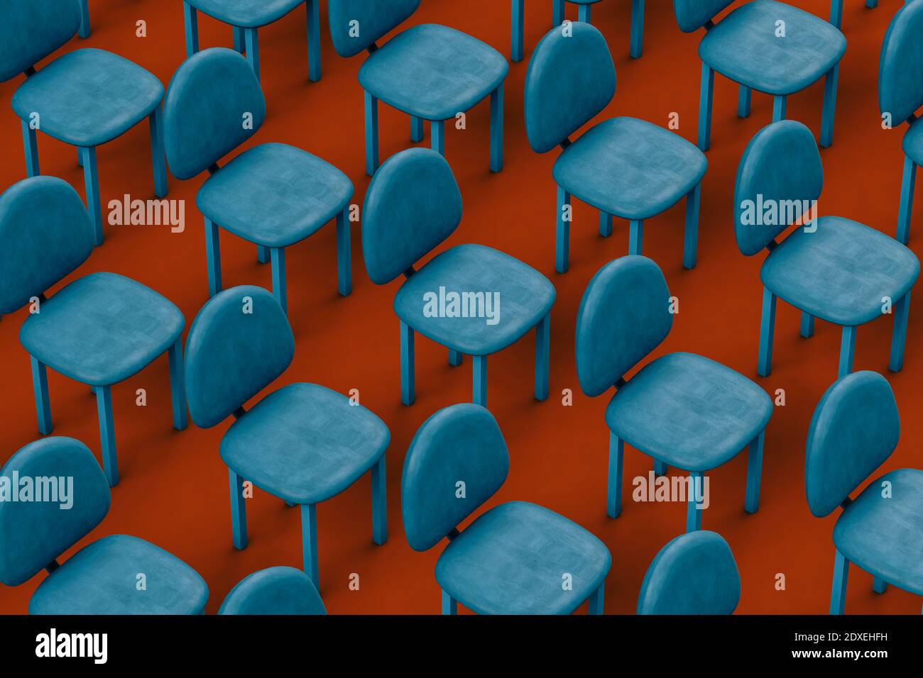 Rangées de chaises vides bleues sur fond rouge Banque D'Images