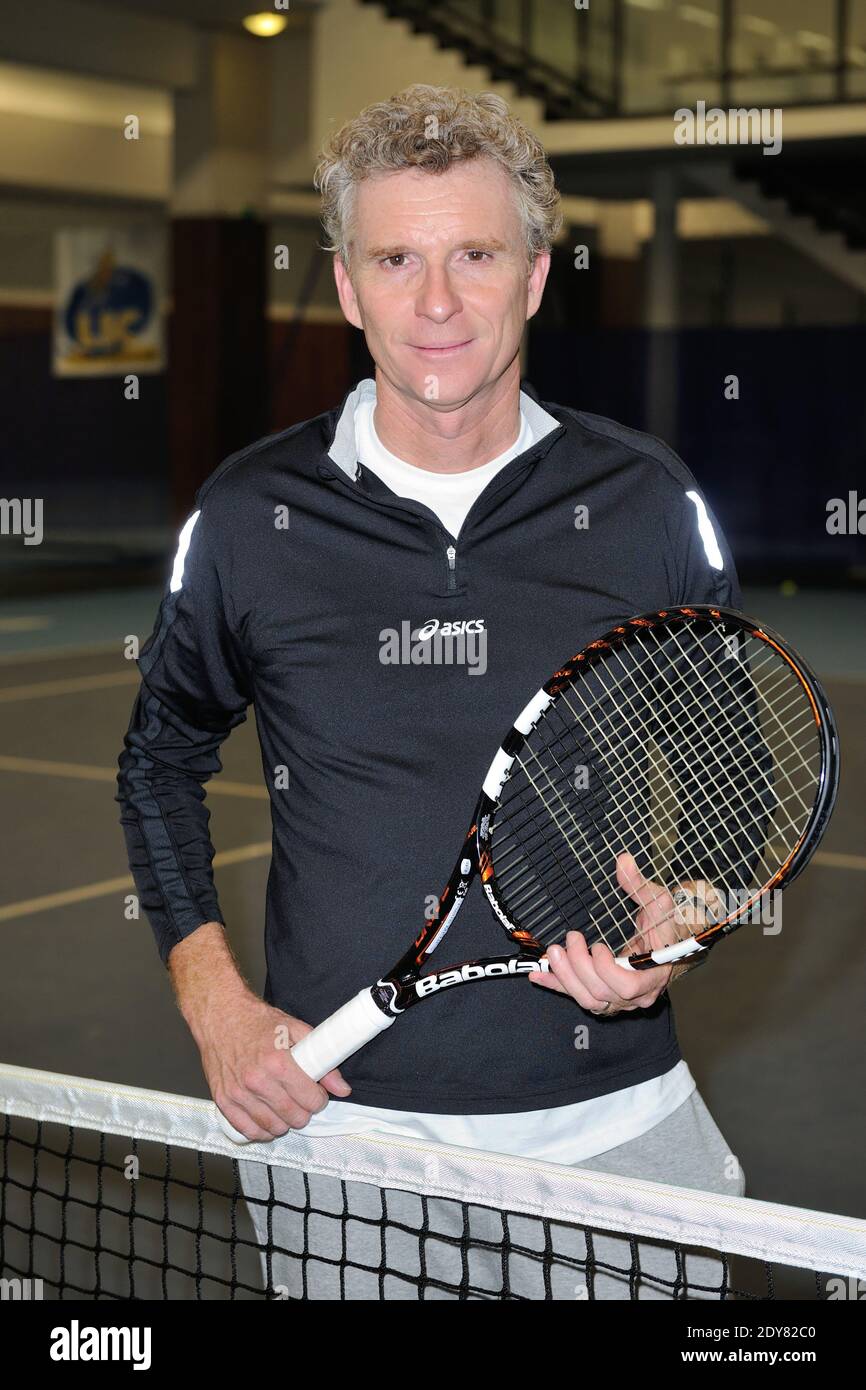 Denis Brogniart participe à l'événement Sourire gagné par l'association  étoile et match de l'enfant au Levallois Sporting tennis Club près de  Paris, France, le 18 décembre 2014. Photo d'Alban Wyters/ABACAPRESS.COM  Photo Stock -