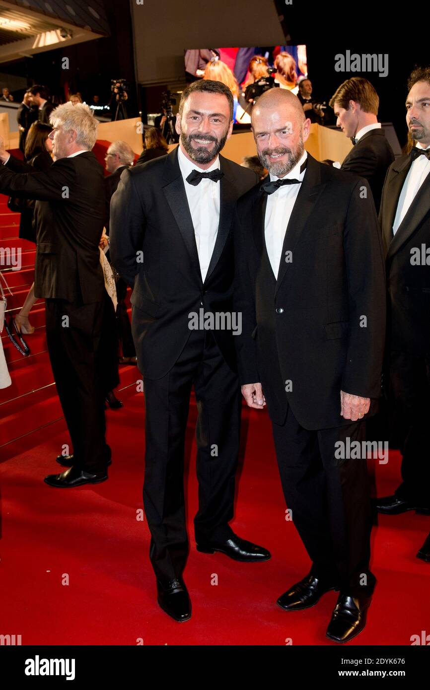 Jean-Paul Cluzel (à droite) et Nicolas Droin, partenaire, arrivent pour la  projection de ''Tian Zhu Ding' le troisième jour du 66e Festival du film à  Cannes, France, le 17 mai 2013. Photo