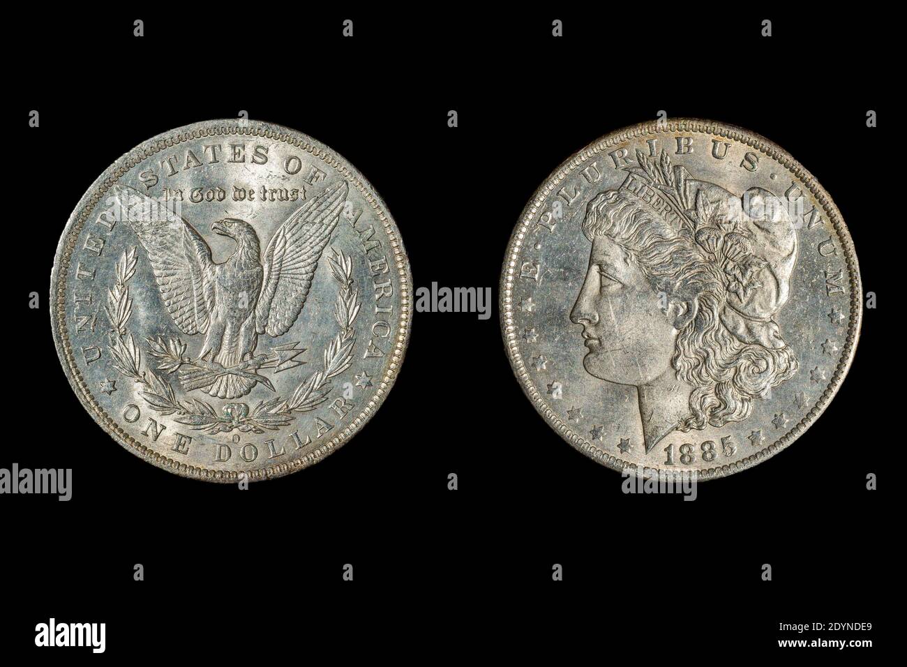 Les deux côtés d'une pièce de 1885 $1 « Liberty Head ». Au dos se trouve un aigle avec des ailes étirées Banque D'Images