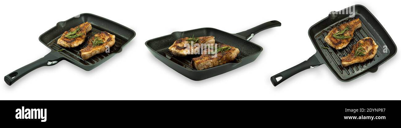 Steak grillé au romarin dans une casserole sur fond blanc. Photo de haute qualité. Banque D'Images