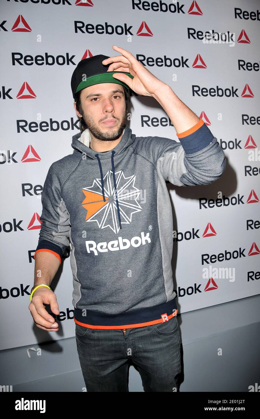 Orelsan participant à l'événement d'ouverture du magasin Reebok concept à l' avenue de l'Opéra à Paris, France, le 4 décembre 2013. Photo de Thierry  Plessis/ABACAPRESS.COM Photo Stock - Alamy