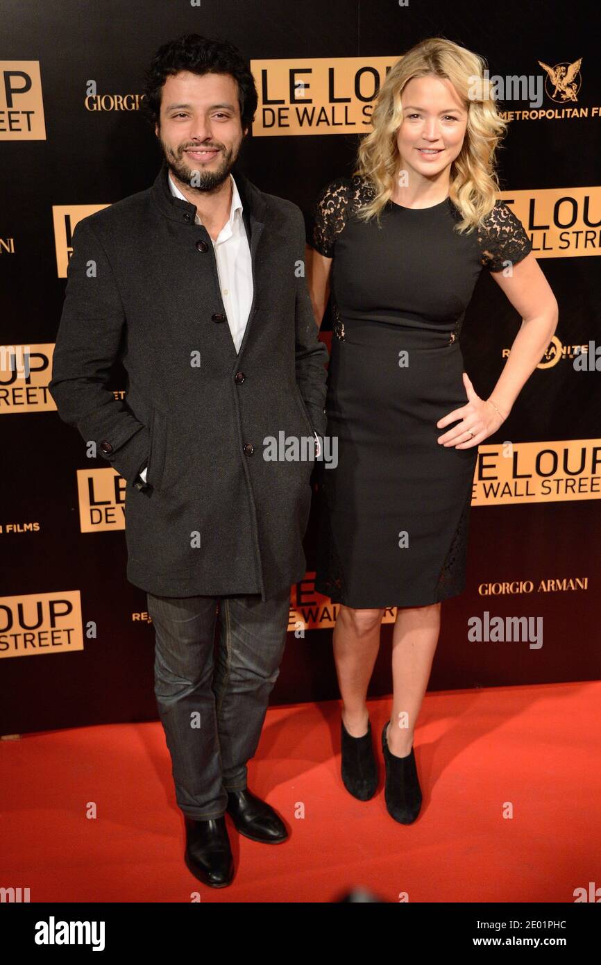 Mabrouk El Mechri et Virginie Efira assistent à la première du film le Loup de Wall Street (le Loup de Wallstreet) qui s'est tenu au Cinéma Gaumont Opera à Paris, France, le 9 décembre 2013. Elle porte une robe de Paule Ka. Photo de Nicolas Briquet/ABACAPRESS.COM Banque D'Images