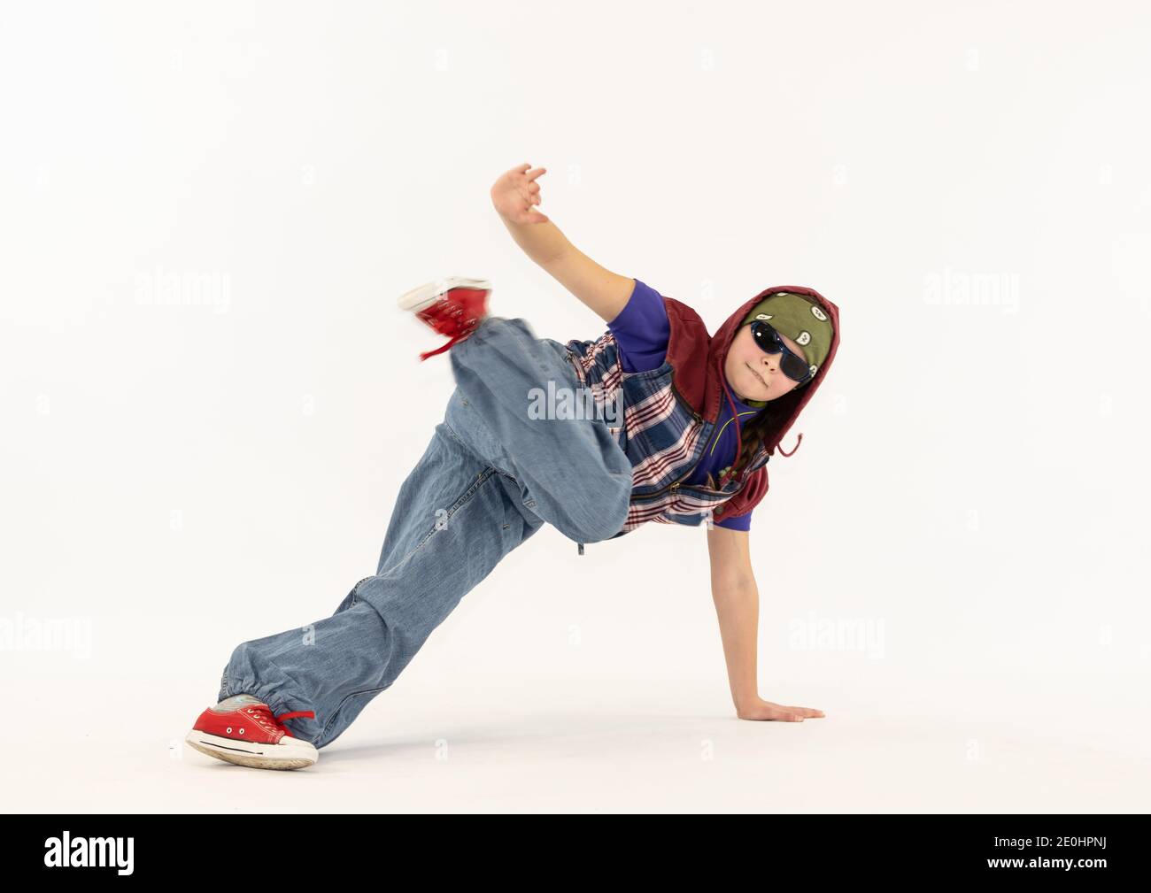 fille dans une posture de breakdance Banque D'Images