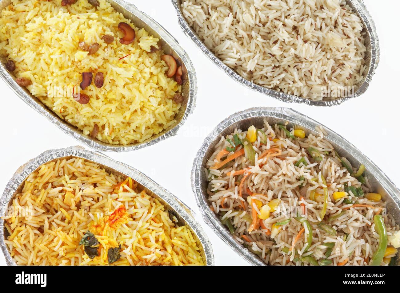 Quatre variétés différentes de riz indien : Biryani végétarien, riz ...