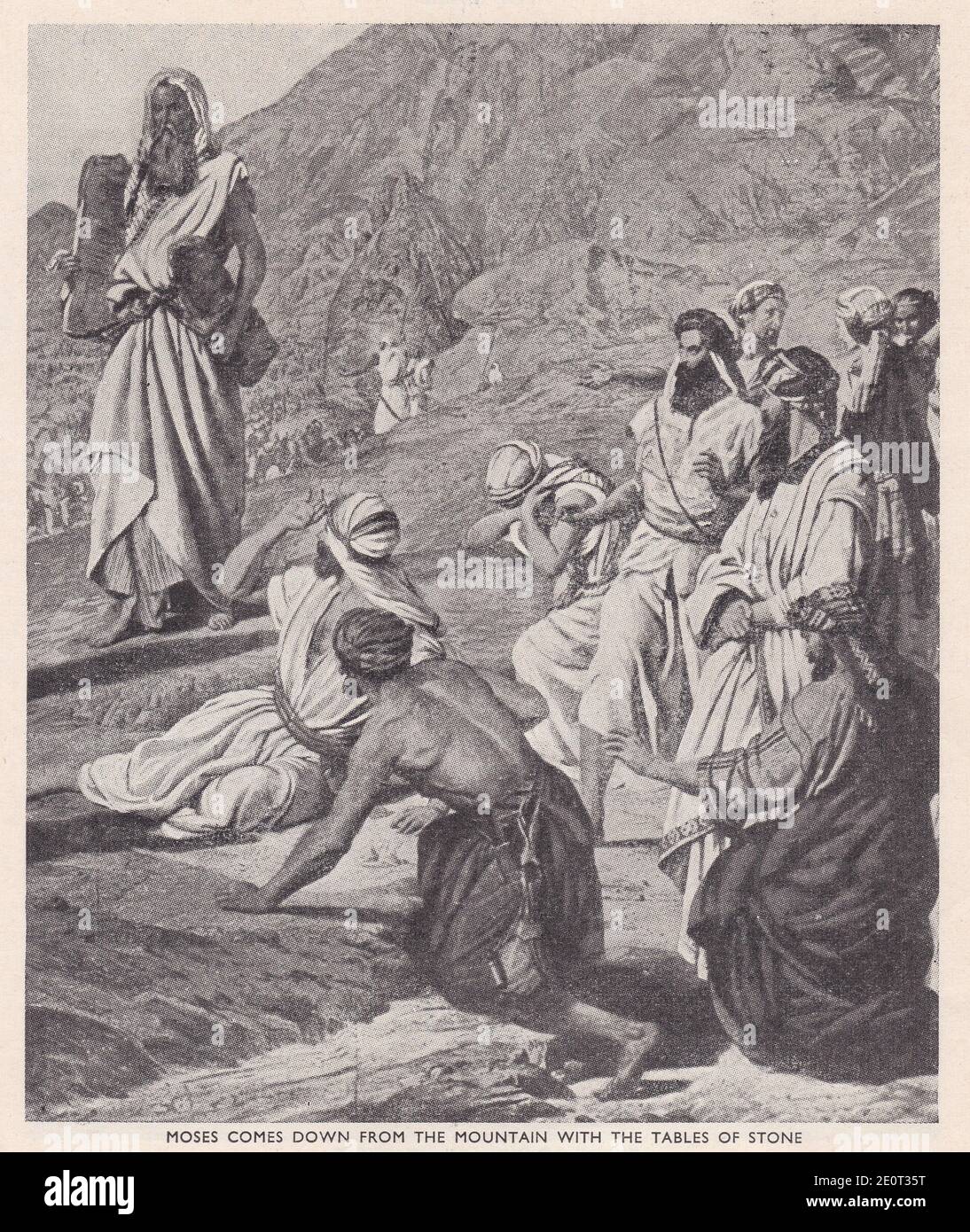 Moïse descend de la montagne avec les tables de pierre. Banque D'Images