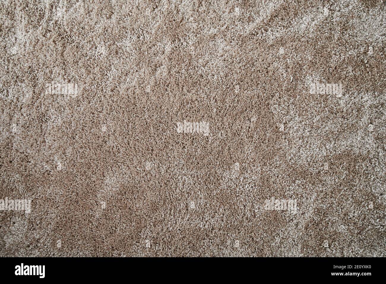 Fond doux marron clair. Surface de tapis de couleur laine beige Banque D'Images