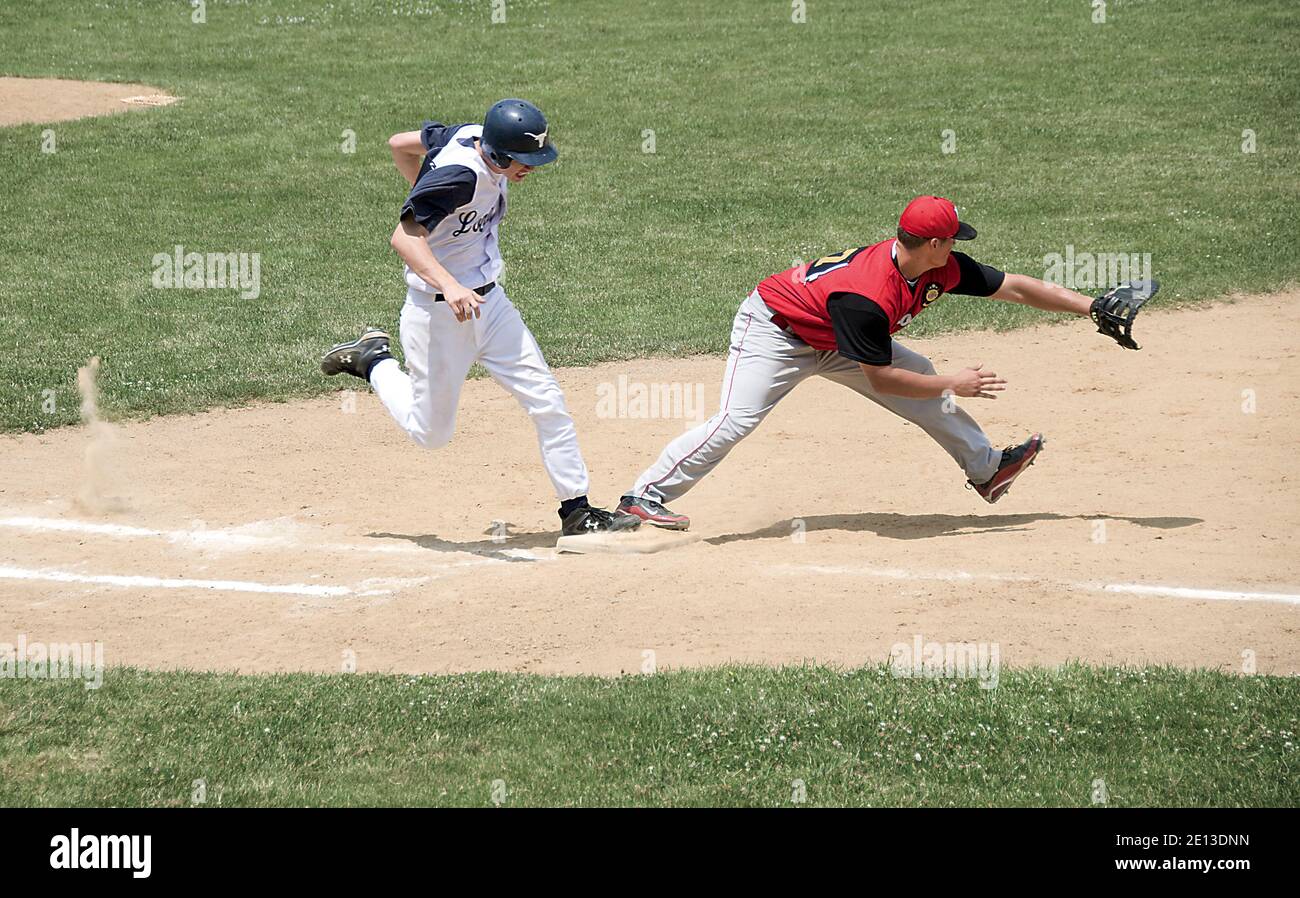 Jeu de baseball à First base Banque D'Images