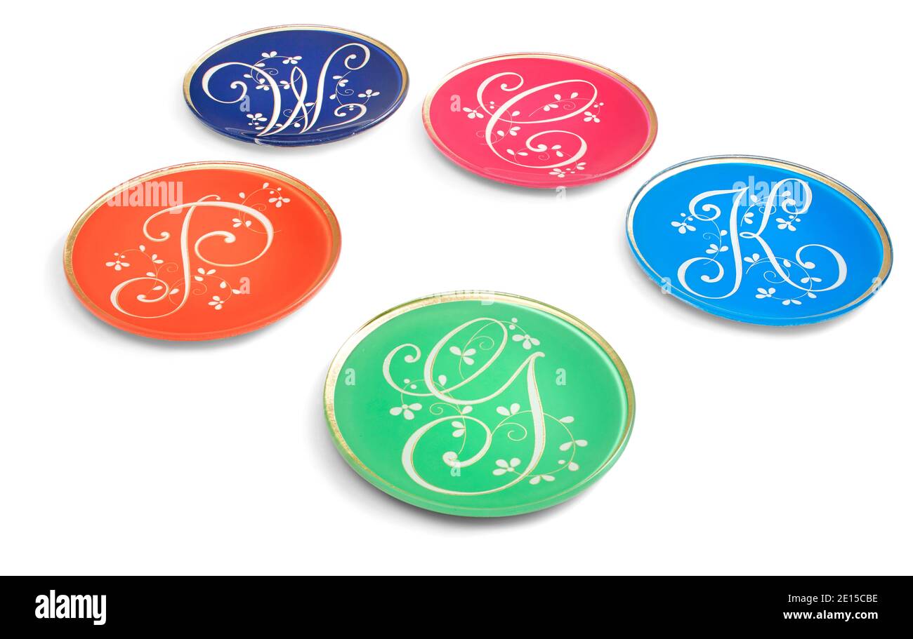 Plaques monogrammées sur le thème floral de la HOLIDAY 2014 C.Wonder look Book photographié sur fond blanc. Banque D'Images