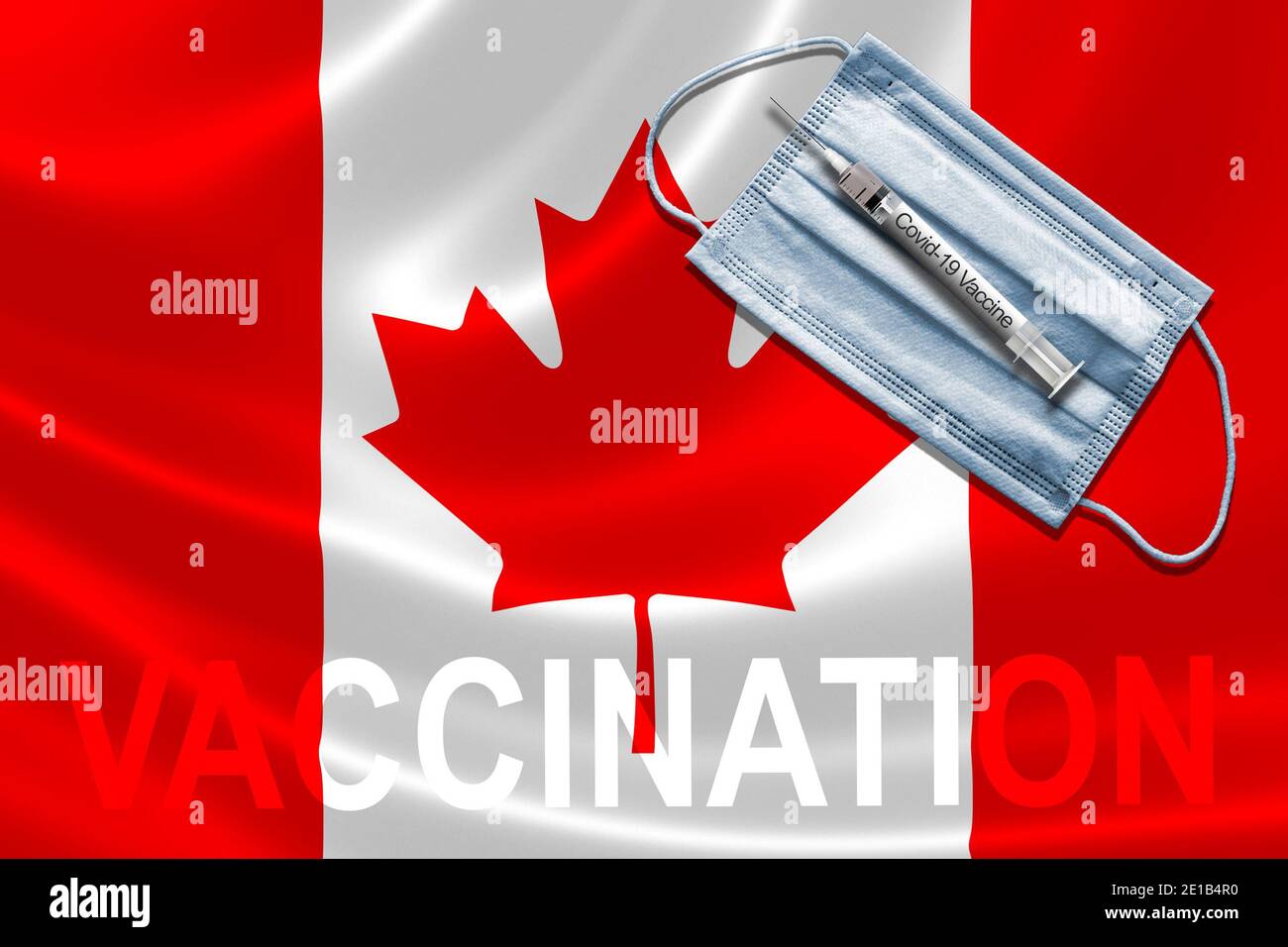 Vaccin COVID-19 au Canada concept avec masque facial et vaccin à aiguille à seringue sur le drapeau canadien. Banque D'Images