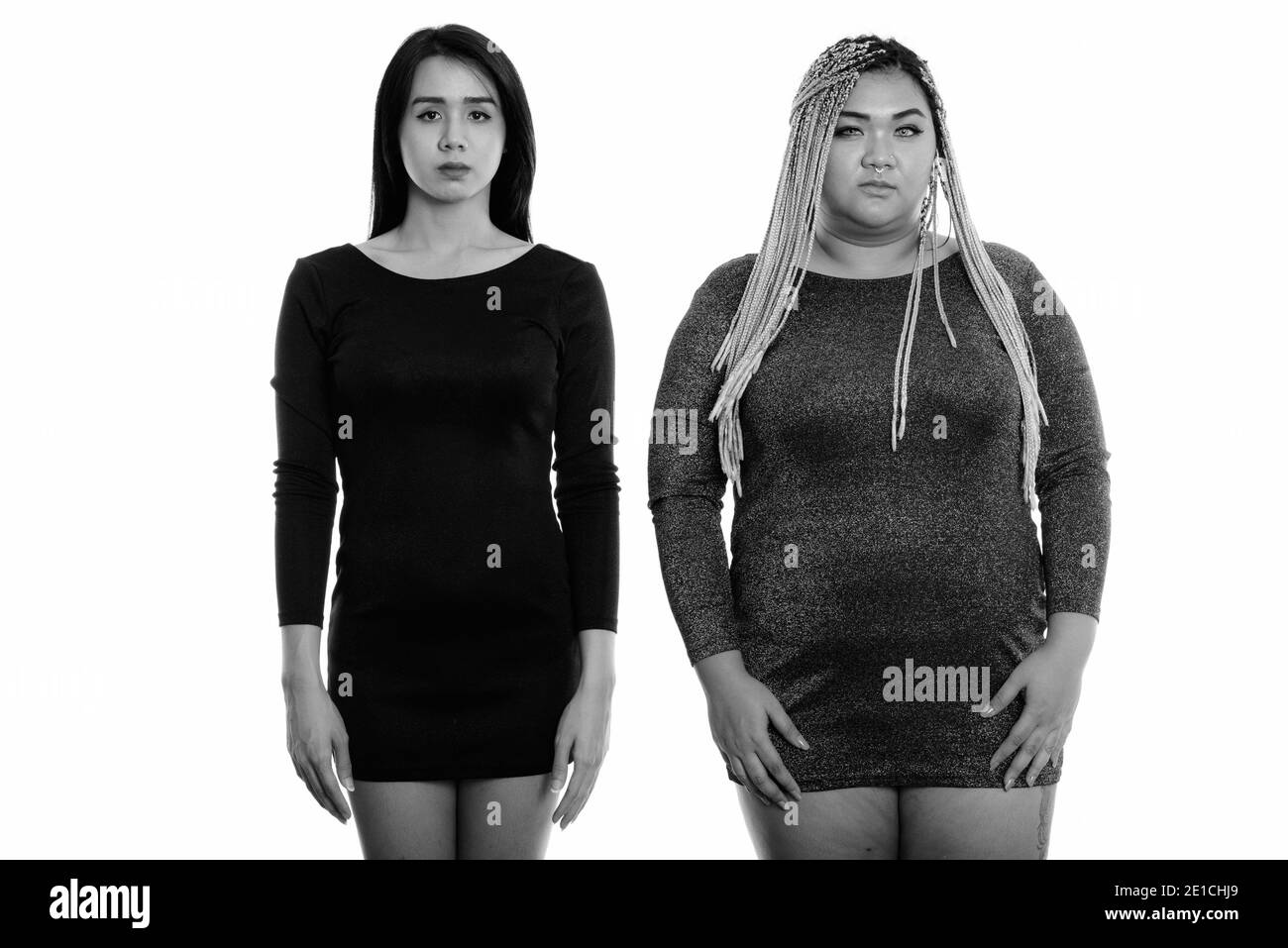 Portrait de jeune femme transgenre et fat woman Standing together Banque D'Images