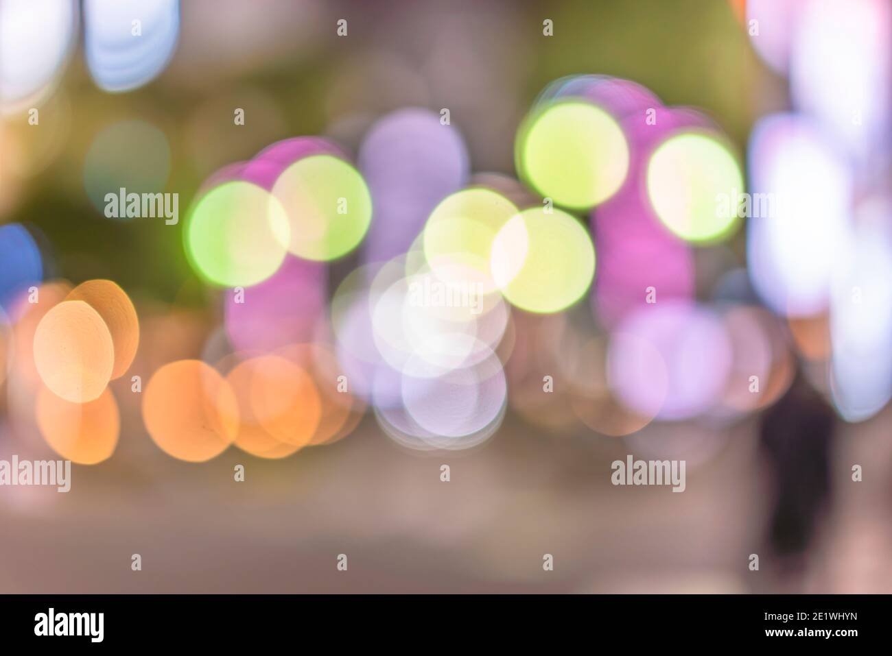 Texture d'arrière-plan de boules de bokeh colorées et brillantes. Banque D'Images