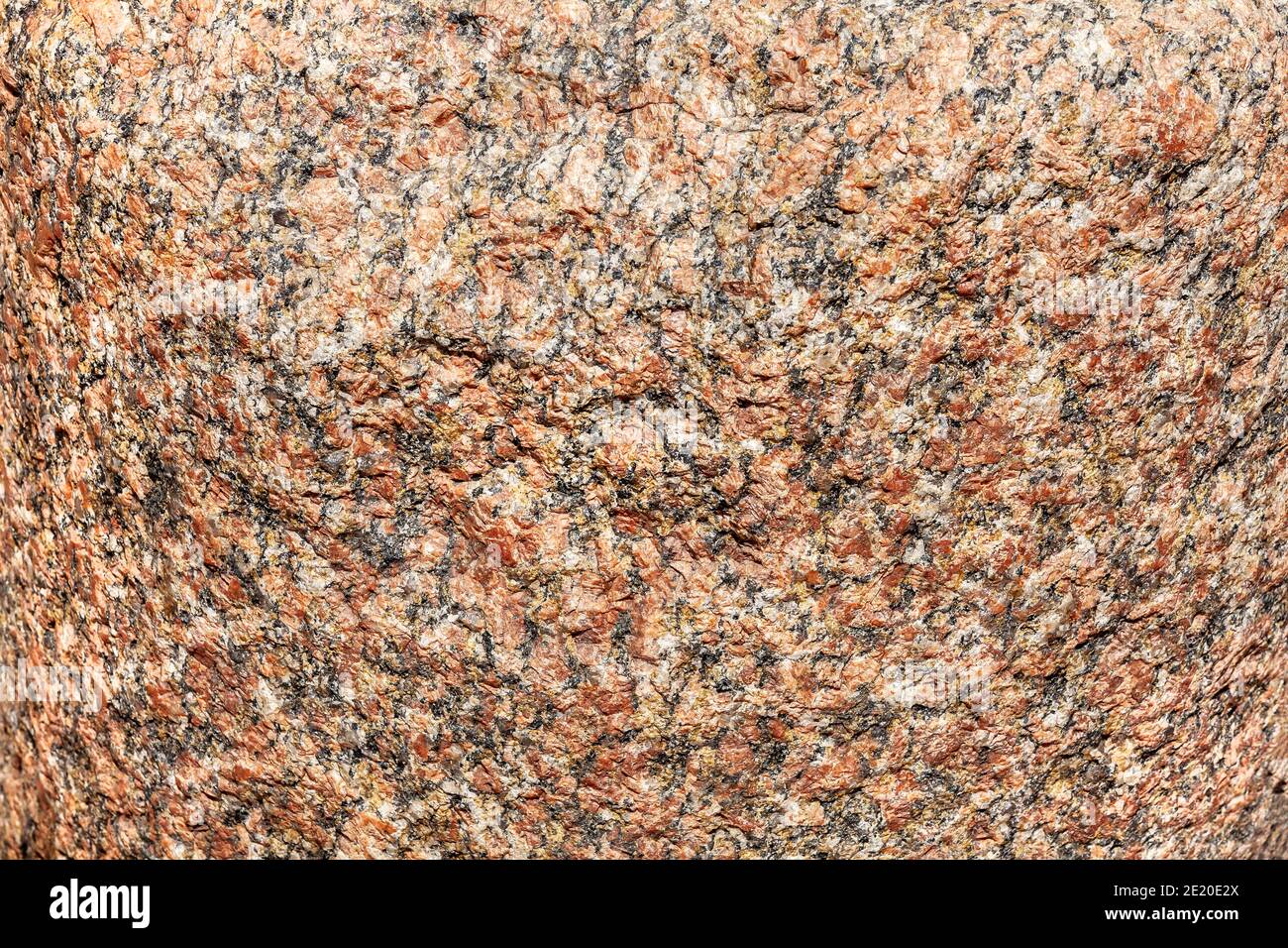 Les feldspath rose et gris granite rock surface Banque D'Images