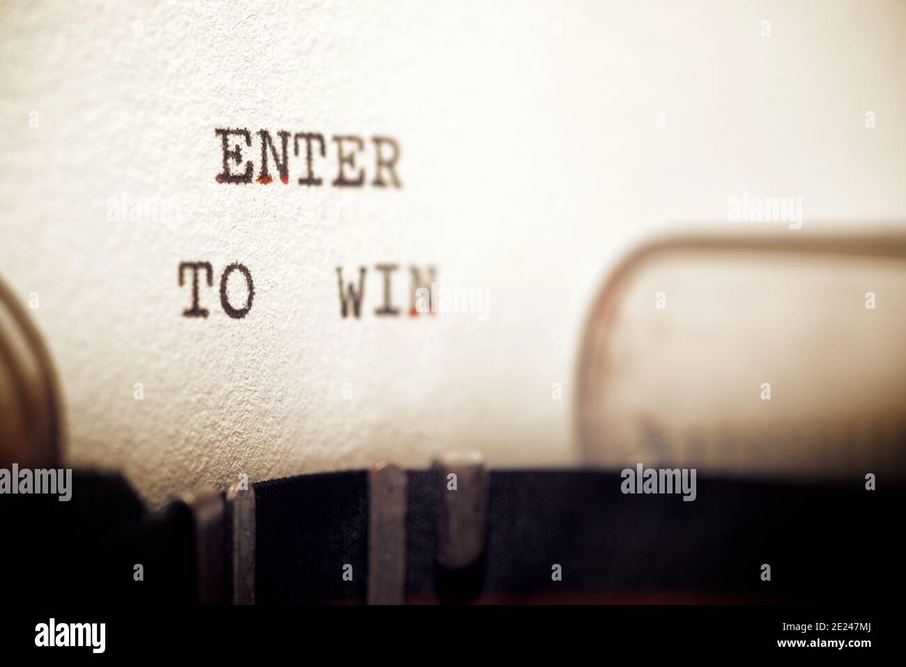 Entrez pour gagner une phrase écrite avec une machine à écrire. Banque D'Images