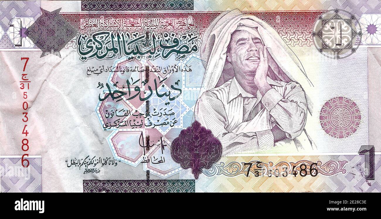 Billet de banque libyen d'un dinar, portant l'image de Kadhafi, vu à Tripoli, en Libye, le 9 septembre 2011. Photo par Ammar Abd Rabbo/ABACAPRESS.COM Banque D'Images