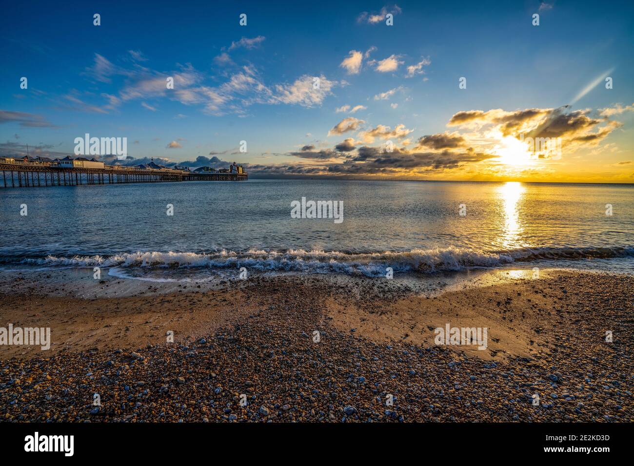 Coucher de soleil sur le Palace Pier, Brighton, East Susaes, Angleterre, Royaume-Uni Banque D'Images