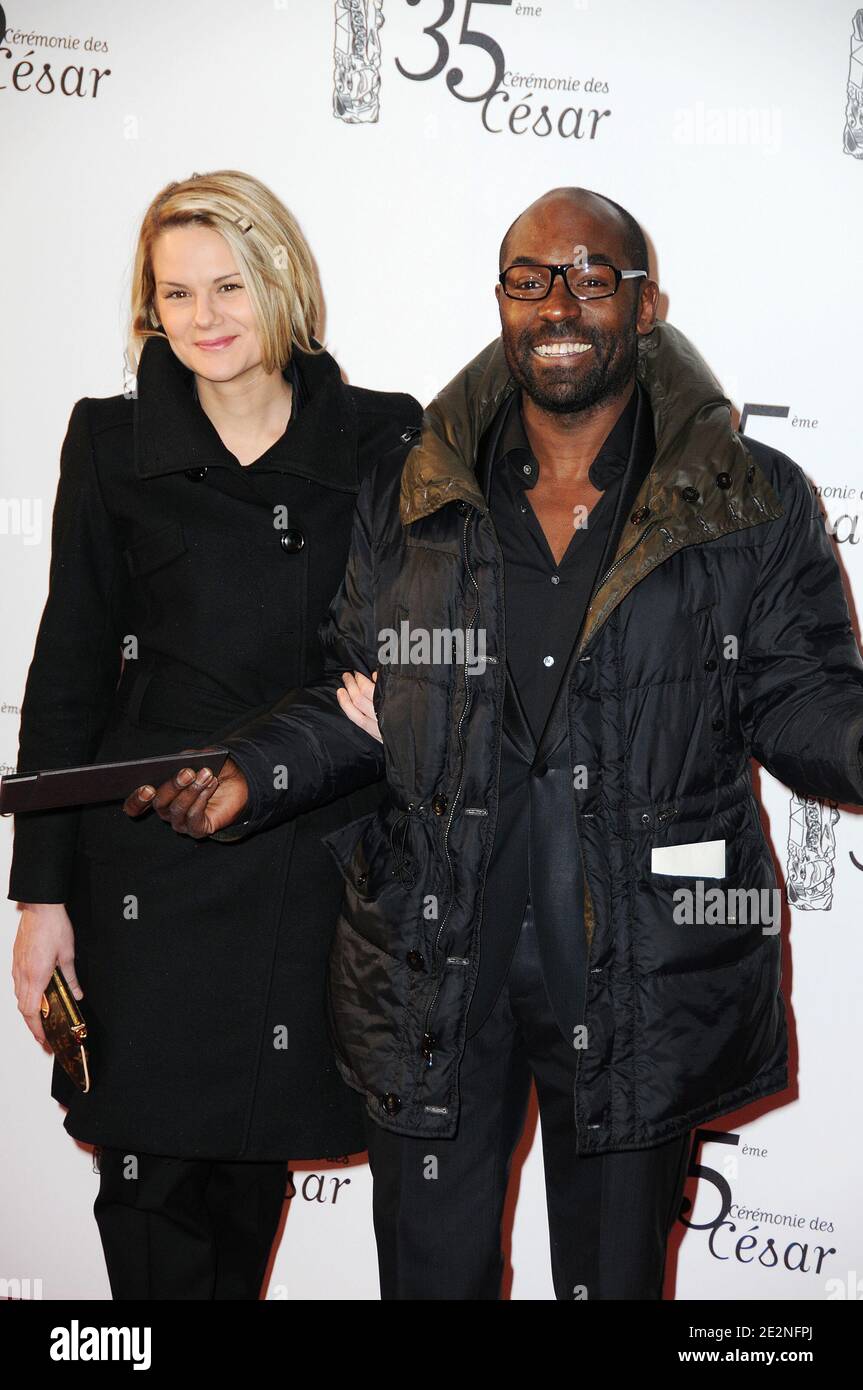 Lucien Jean-Baptiste et son épouse arrivent à la 35e cérémonie de César  (prix du cinéma français) qui s'est déroulée au Théâtre du Châtelet à  Paris, en France, le 27 février 2010. Photo