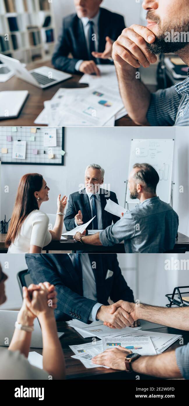Collage d'investisseur souriant en train de se faire le bien avec un homme d'affaires près de papiers et femme d'affaires au bureau Banque D'Images