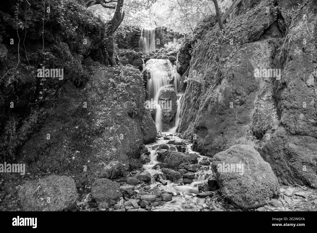 Longue exposition chute d'eau de Clampitt Falls aux chutes Canonteign de Dartmoor Banque D'Images