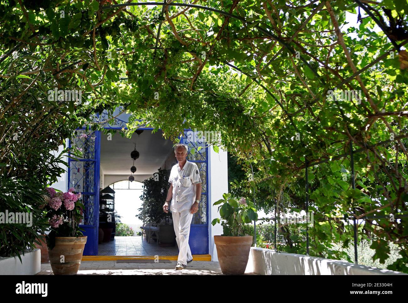 Directeur du restaurant Ocean, Philippe Morin, plage Sidi Kacem, Tanger, Maroc, juillet 2010. Photo de Stephane Lemouton/ABACAPRESS.COM Banque D'Images