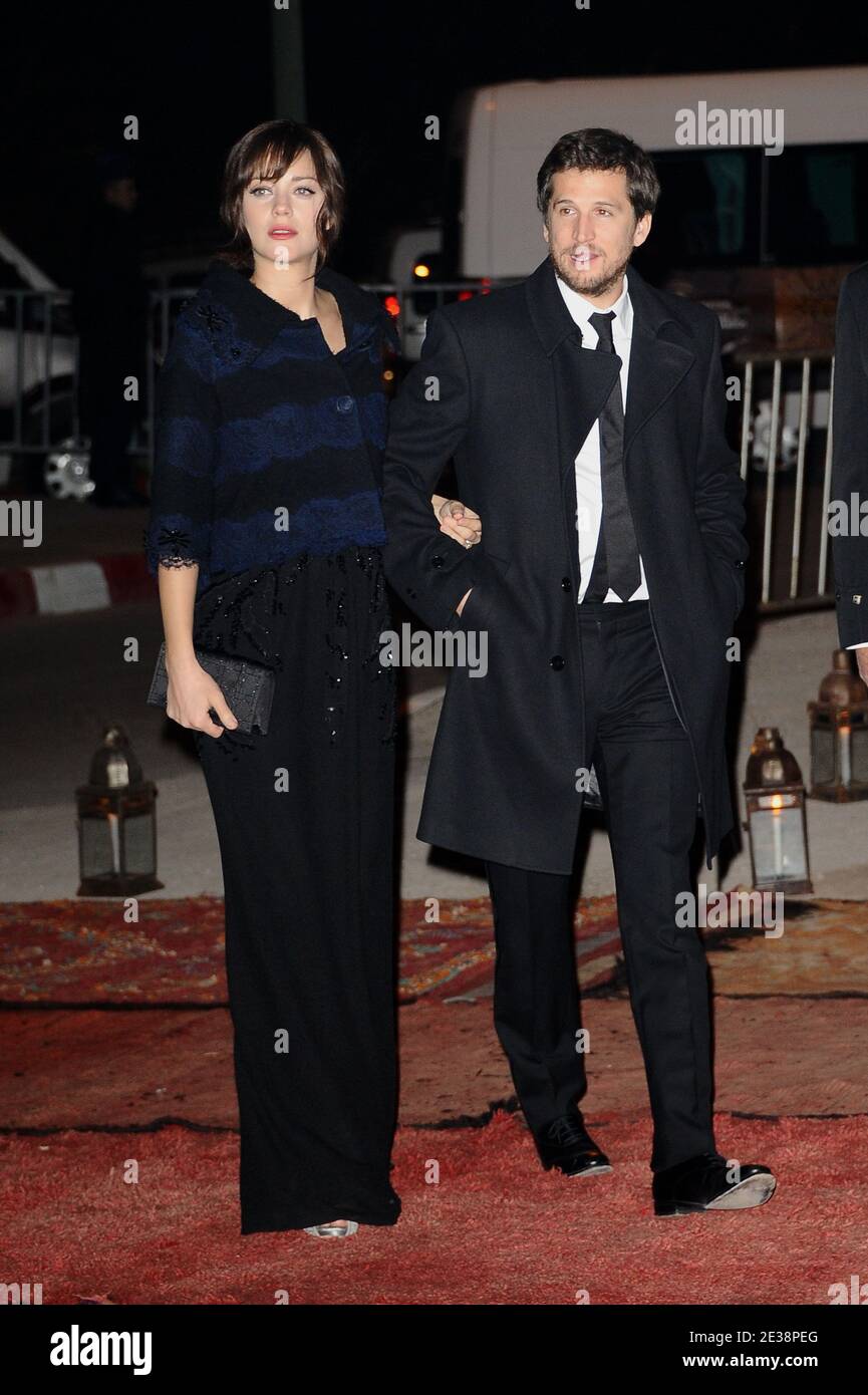 marion cotillard et guillaume canet arrivent a la fete de dior lors du 10eme festival du film de marrakesh a marrakech au maroc le 4 decembre 2010 photo de nicolas briquet abacapress com photo