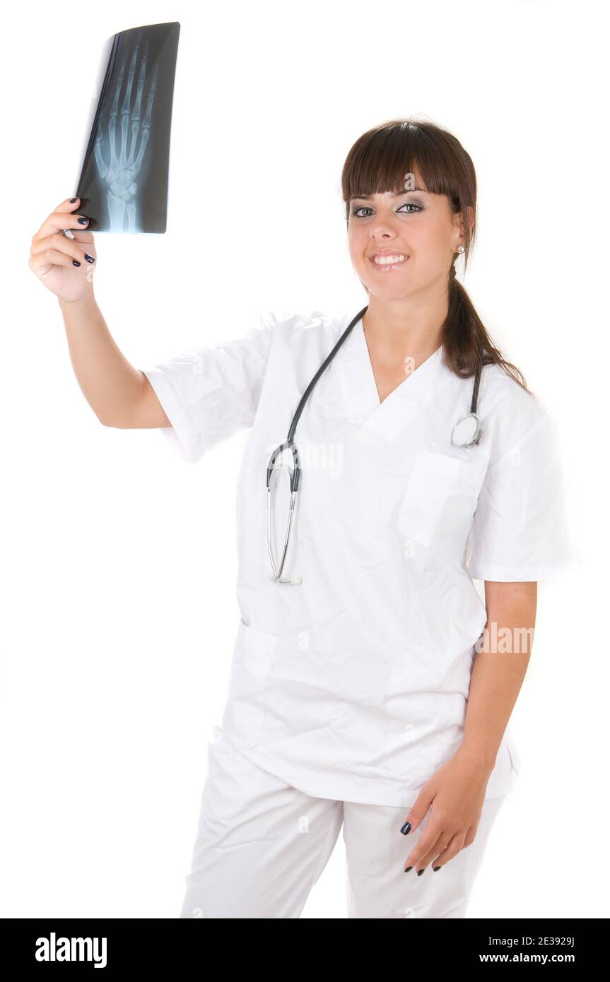 femme médecin avec une radiographie des mains dans ses mains Banque D'Images