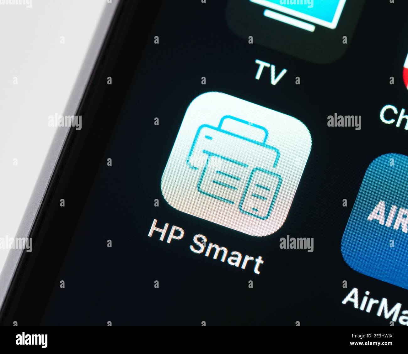 Icône de l'application HP Smart sur l'écran de l'iPhone d'Apple.  L'application HP Smart comprend des outils permettant d'imprimer, de  numériser, de vérifier les niveaux d'encre et de configurer votre  imprimante sur un