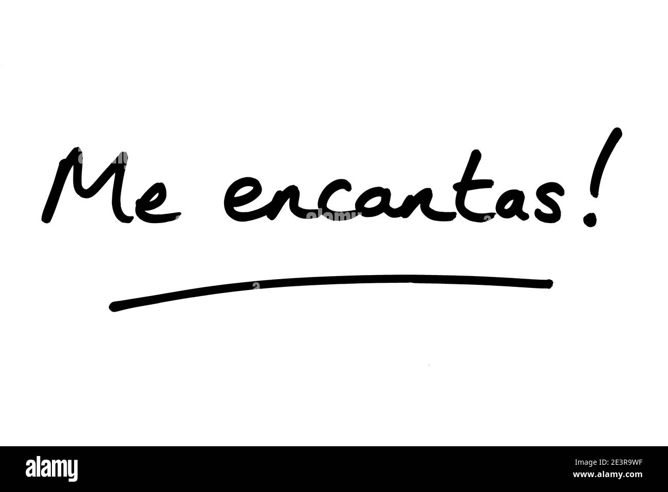 Moi encantas! - ce qui signifie que je vous aime vraiment, en espagnol, manuscrit sur fond blanc. Banque D'Images