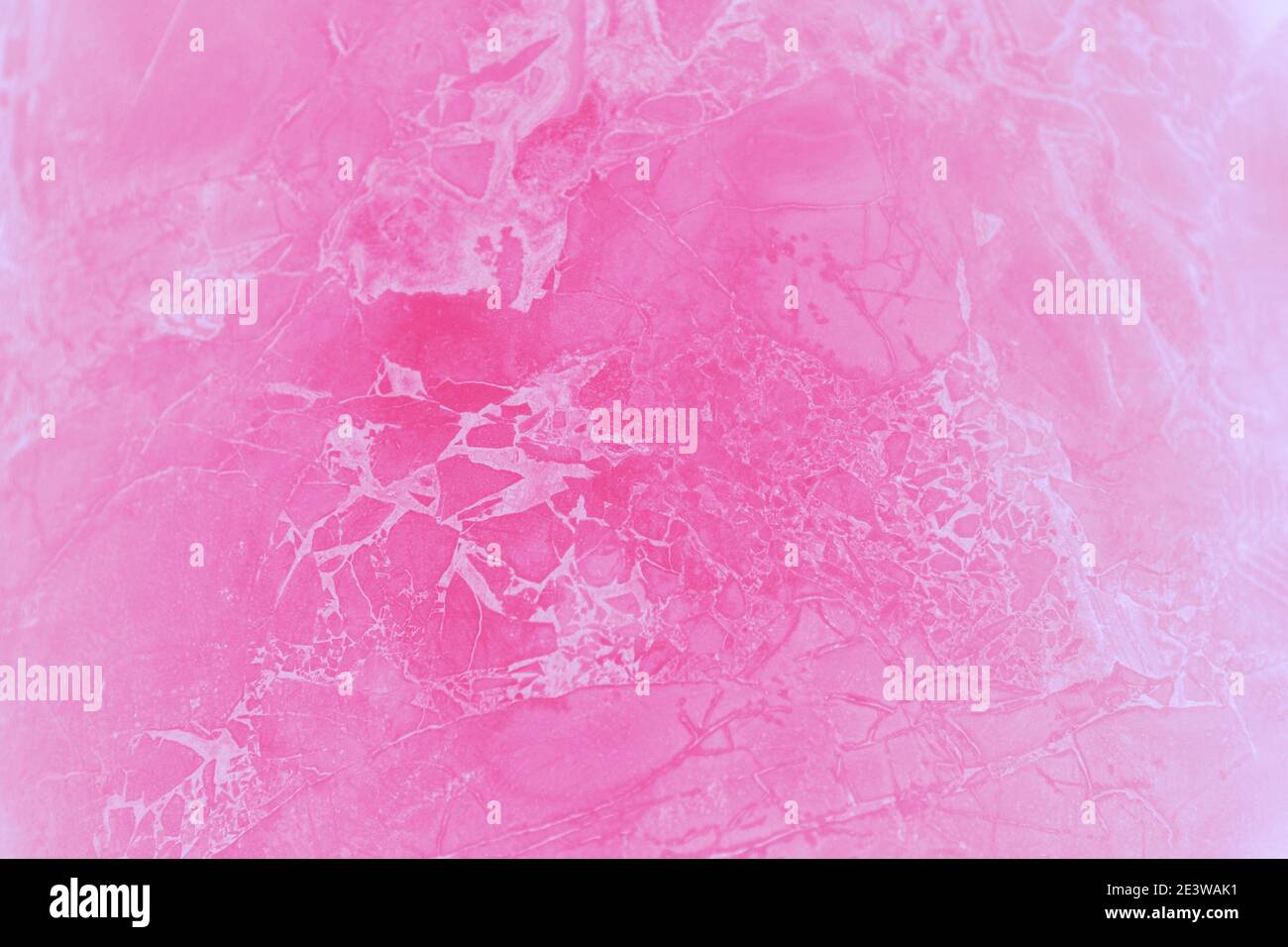 Mur dégradé rose avec motif en marbre Banque D'Images