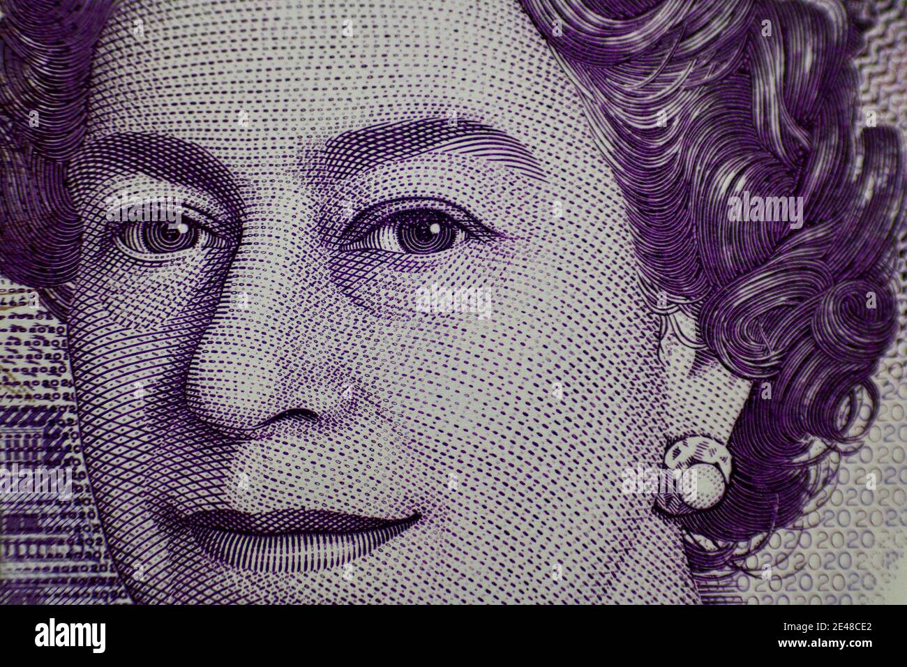 Macro gros plan d'une note vingt livres avec le Face de la Reine Banque D'Images