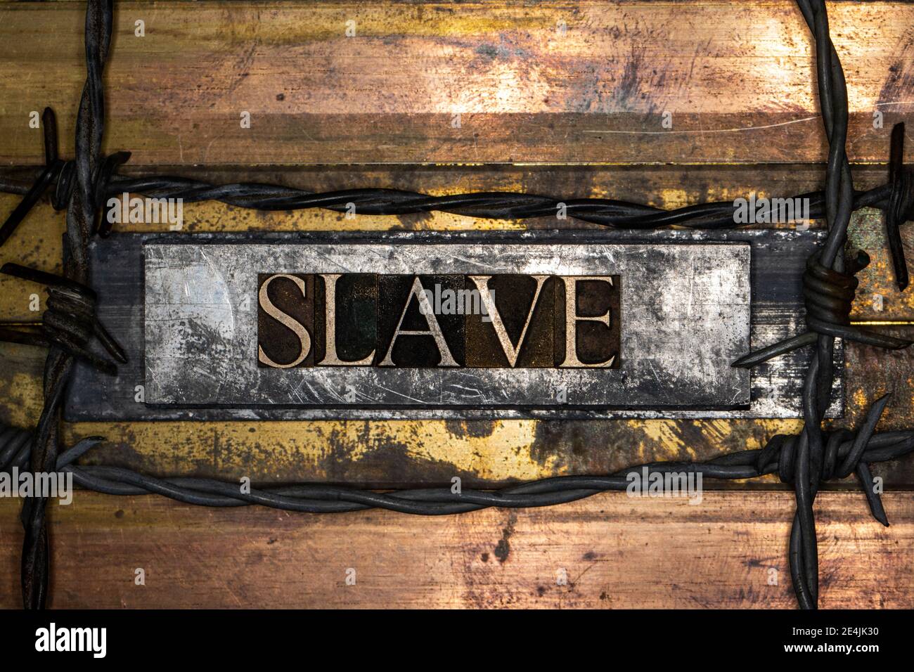 Texte esclave sur fond de cuivre et d'or texturé vintage Banque D'Images